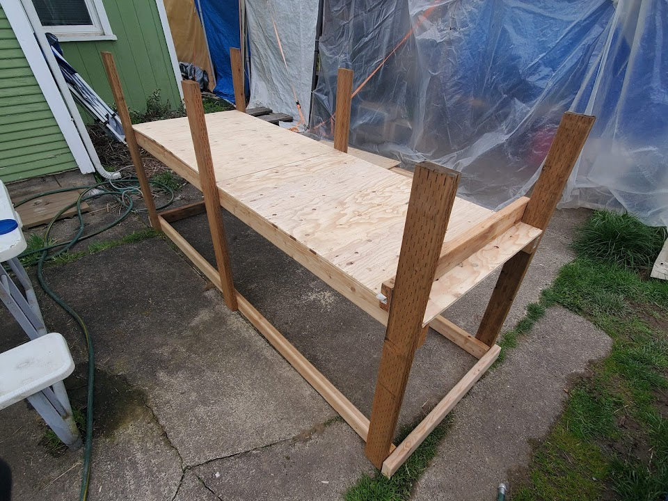 I found it easier to brace and square the frame before attaching the other side of the bottom panel. 